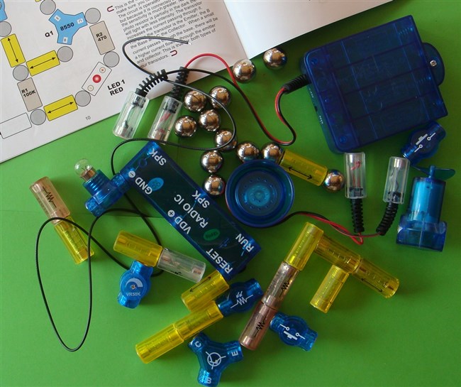 Build electronic circuits with balls and magnets